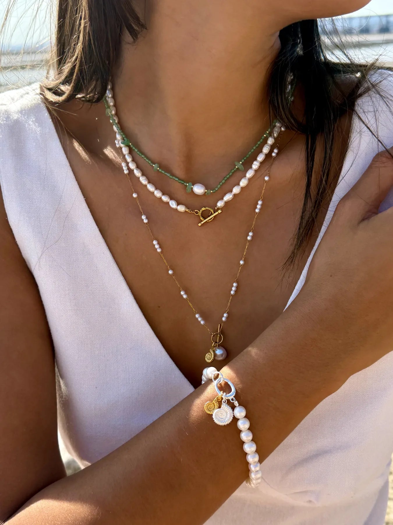 Coastal Collection layered pearl and ammonite jewellery look